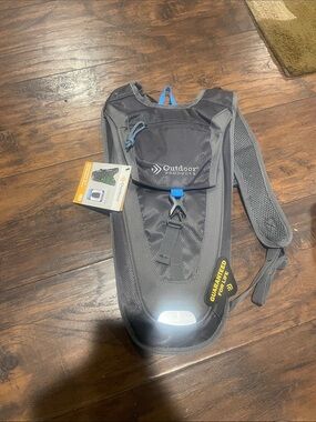 Outdoor Products Kilometer 8.0 Hydration Pack in Black with Blue Accent